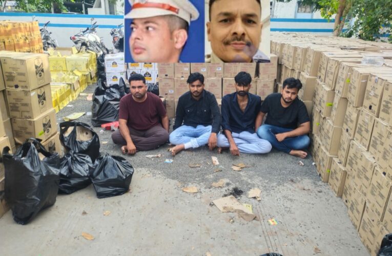 ગોંડલના બિલિયાળા નજીક અવધ ઇન્ડ.એરિયાના ગોડાઉનમાં કટિંગ સમયે જ SMC ત્રાટકીઃ ટમેટાના કેરેટ નીચે છૂપાવેલી 12084 બોટલ મળી.